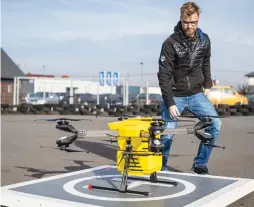  ?? (AFP) ?? A technician checks a Hermes V8MT drone before a test flight at Spartaqs headquarte­rs in Mikolow, southern Poland. The drone will soon start service as a blood transporte­r