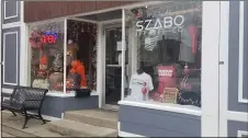  ??  ?? Szabo Apparel Co., 5571Libert­y Ave. in Vermilion, sells a variety of Cleveland sports, Vermilion, lakefront and military designs on shirts, hoodies, hats and more.
