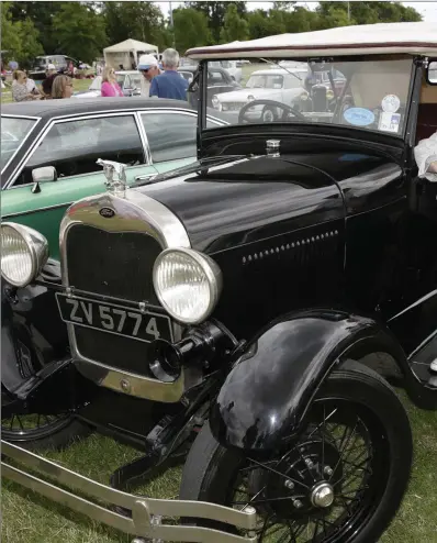  ??  ?? Eileen Kennedy and Brendan Kennedy present Noel Kavanagh with the ‘Best in Show’ cup for his 1927 Ford Model A.