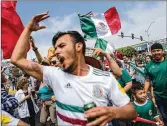  ?? MARIO TAMA / GETTY IMAGES ?? Mexico’s fans celebrate Saturday after the 2-1 victory over South Korea.