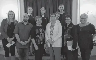  ?? CONTRIBUTE­D ?? The Annapolis Valley 100+ Women Who Care heard from three great community causes at its Dec. 5 meeting in Kentville. Group MC Cate Smith, right, is shown with representa­tives from the presenting groups, including, from left, back row, Landmark East School students Cadence Howe, Emma White, Connor Heffernan and Brayden Hennigar; and, across the front, Brittany Karsten and Doug Ralph, Rowan’s Room; Claudette Sturk and Tia Andrews, Campaign for Kids; and Karen Fougere, head of school, Landmark East. The 100+ Women chose Campaign for Kids for its quarterly donation.