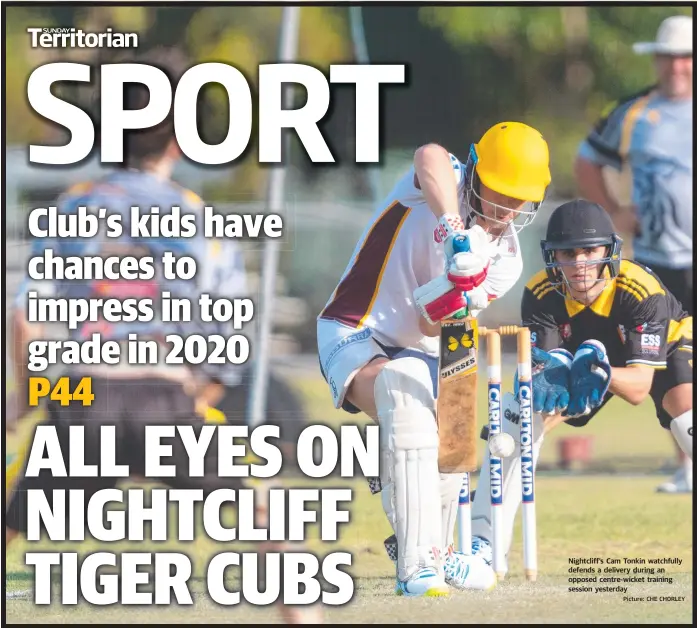  ?? Picture: CHE CHORLEY ?? Nightcliff’s Cam Tonkin watchfully defends a delivery during an opposed centre-wicket training session yesterday