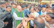  ?? PTI ?? BJP chief Amit Shah interacts with representa­tives of Handloom &amp; Powerloom Associatio­ns in Tamil Nadu’s Erode on Thursday.