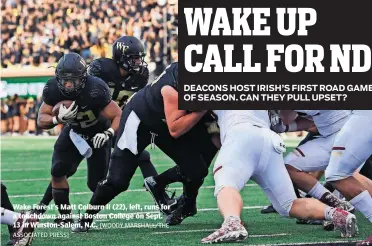  ?? [WOODY MARSHALL/THE ASSOCIATED PRESS] ?? Wake Forest’s Matt Colburn II (22), left, runs for a touchdown against Boston College on Sept. 13 in Winston-Salem, N.C.