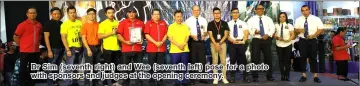  ??  ?? Dr Sim (seventh right) and Wee (seventh left) pose for a photo with sponsors and judges at the opening ceremony.