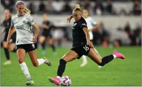  ?? PHOTO BY RAUL ROMERO JR. ?? Angel City FC defender M.A. Vignola controls the ball during the first half of a 1-0 loss to the Orlando Pride on Monday night at BMO Stadium.