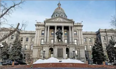  ??  ?? The Colorado State Capitol Building in Denver.