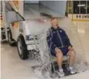  ?? DAVID COOPER/TORONTO STAR ?? Toronto Maple Leafs coach Randy Carlyle uses a Zamboni to help out with his ice-bucket challenge for ALS Canada.