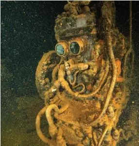  ??  ?? Getting wrecked ... 20 metres below the surface, a diver floats over a Betty bomber (opposite page); the live- aboard Odyssey (above); the Odyssey's dining room (left); an air compressor in the engine room of the
Fujikawa Maru (right).