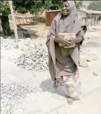  ??  ?? Hauwa Abdullahi one of the stone sellers