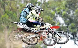  ?? Picture: EUGENE COETZEE ?? AIRBORNE BATTLE: Motocross racers Roy van Niekerk and Anthony Raynard jockey for position in the MX2 class at the SA Motocross Nationals held at the Rover Motorcycle Club at the weekend