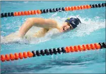  ?? COURTESY EMILY THOMAS ?? Pope John Paul II sophomore Henry Phillips swims at the District 1 Class 2A championsh­ip Feb. 27.