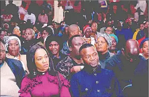  ?? (Pic: Courtesy) ?? Gospel Artist Linda Dlamini (R) and Lady Bishop QT Ngobeni listening to Apostle Joshua Moosa Mohlala preaching at Bosco Skills Centre in Manzini.