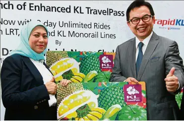  ??  ?? Worry-free and convenient: Nancy and Mohd Nadzmi at the launch of the new travel pass.