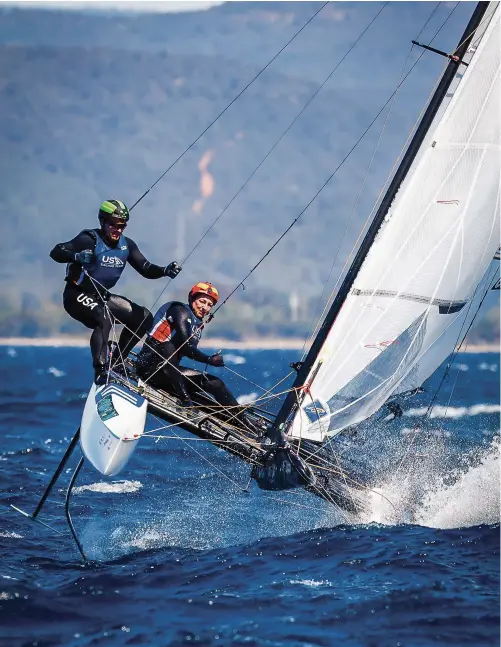  ?? PHOTO: SAILING ENERGY ?? Sarah Newberry Moore and David Liebenberg wrestle with their Nacra 17 at an Olympic regatta in France in April. Newberry Moore has
multiple major US multihull championsh­ips and has been campaignin­g for nearly a decade.