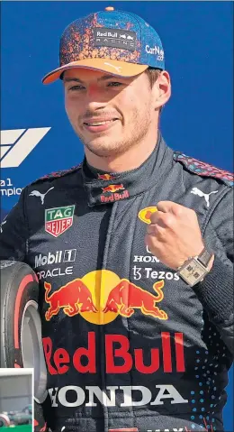  ?? ?? Max Verstappen celebrates taking pole position while Lewis Hamilton, left, had to be content with second place