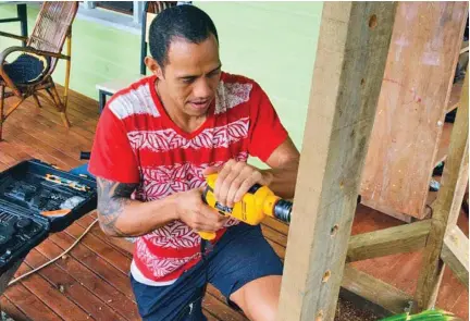  ?? Photo: Supplied ?? National triple jump champion Eugene Vollmer making his own gym equipment.