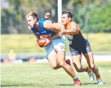  ?? Picture: Keith McInnes/NEAFL ?? Sam Day is tackled in the GWS loss.