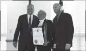  ??  ?? Doris Cammack-Spencer of Chesapeake Beach, president and CEO of the Southern Maryland Minority Chamber of Commerce, accepted a Governor’s Citation from Herbert Jordan III, deputy secretary of the Governor’s Office of Minority Affairs (GOMA), left, and...
