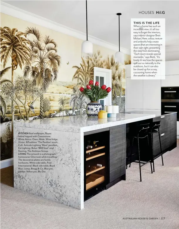  ??  ?? KITCHEN Iksel wallpaper, Boyac. Island topped with Caesarston­e
White Attica. Oven, Miele. Wine fridge, Vintec. &Tradition ‘The Pavilion’ stools, Cult. Articolo Lighting ‘Moni’ pendant, Est Lighting. Bolon ‘BKB Sisal’ vinyl flooring, The Andrews Group.
LIVING The artwork is a photograph homeowner Clive took while travelling. The decorative plates are family heirlooms. White side table, Fred Internatio­nal. Black side table, Boyd Blue. Lamp, Bragg & Co. Blue pot, Jardan. Yellow pot, Blu Dot. 117