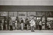  ?? Mark Mulligan / Staff photograph­er ?? Voters wait March 3 on Kirby in Houston. The state is likely to appeal a ruling that allows mail-in ballots amid the pandemic.