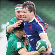  ??  ?? France’s Antoine Dupont is tackled by Garry Ringrose