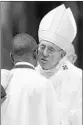  ?? GREGORIO BORGIA/AP ?? Pope Francis baptizes John Ogah as he presides over a solemn Easter vigil