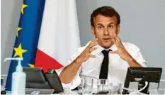  ?? Foto: Ludovic Marin, dpa ?? Viele Franzosen haben nur wenig Vertrauen in die Fähigkeite­n von Emmanuel Macron als Krisenmana­ger in Zeiten der Pandemie.