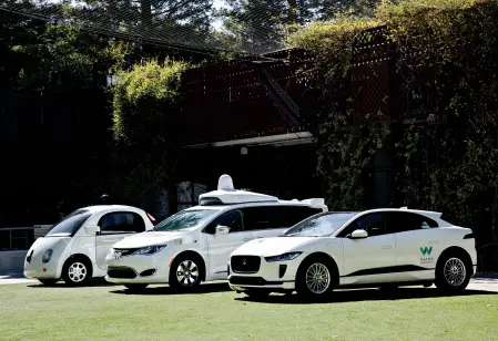  ??  ?? From left: Waymo’s Firefly, Chrysler Pacifica and Jaguar I-PACE. Waymo is also testingsel­f-driving Peterbilt tractor-trailers for freight deliveries.