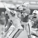  ?? MICHAEL LAUGHLIN/SUN SENTINEL ?? Ex-Hurricanes safety Bubba Bolden breaks up a pass against Pitt on Oct. 17.