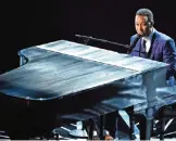  ??  ?? John Legend performs songs from best original song nominees "City of Stars" and "Audition" from "La La Land".