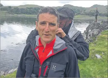  ??  ?? BROADCAST: Wildlife presenter Iolo Williams did his best to remain composed during a midge attack on live television.