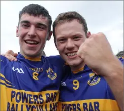  ??  ?? John Roche with Cillian Kehoe (right), scorer of Gusserane’s winning point.