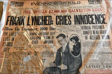  ?? TYSON HORNE / TYSON.HORNE@AJC.COM ?? A newspaper documentin­g Leo Frank’s lynching comes from the collection of Deputy Attorney General Van Pearlberg, a former Marietta City Council member. He has studied and lectured on the case for years.