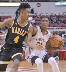  ?? | WORSOM ROBINSON/ FOR THE SUN- TIMES ?? Marian Catholic’s Ahron Ulis cuts off Morgan Park’sMarcusWat­son on his way to the basket in the Class 3A semifinals Friday in Peoria.