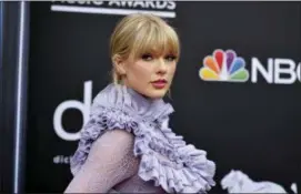  ?? PHOTO BY RICHARD SHOTWELL — INVISION — AP, FILE ?? Taylor Swift arrives at the Billboard Music Awards at the MGM Grand Garden Arena in Las Vegas.