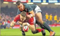  ??  ?? WILL POWER: Liam Williams scores Wales’ second