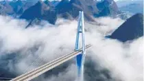  ?? OU DONGQU / XINHUA ?? The Pingtang Bridge is a major connection on the Pingtang-Luodian Expressway in Southwest China’s Guizhou Province.