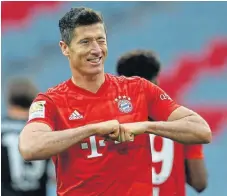  ?? /AFP ?? Sharp shooter: Bayern striker Robert Lewandowsk­i celebrates one of his two goals against Fortuna Duesseldor­f.