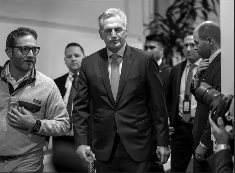  ?? J. SCOTT APPLEWHITE / ASSOCIATED PRESS ?? House Speaker Kevin Mccarthy, R-calif., emerges from a closed-door Republican strategy session Wednesday at the Capitol in Washington to talk to reporters about updates on funding the government and averting a shutdown.