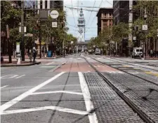  ?? Jessica Christian/The Chronicle 2022 ?? San Francisco’s Market Street saw few people last June. New data shows how many people left the city in recent years.