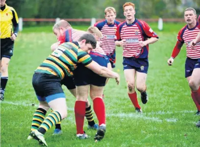  ?? Barry Hobson ?? ●●Matt Goldthorpe on defensive duty for Boro against neighbours Oldham