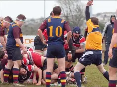  ??  ?? Wicklow’s Andrew Doyle touches down for a try.