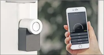  ?? NUKI SMART LOCK/WIKIMEDIA COMMONS] ?? A smart doorbell connects to an app for your phone or tablet. Its camera will show you who’s at your door, and you’ll be able to talk to them as if you are at home, even when you’re actually at work or on the go.