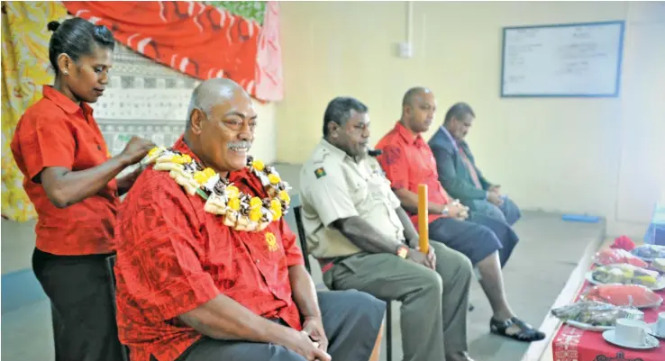  ?? Photo: RFMF MEDIA CELL ?? Retiring Warrant Officer Class One (WO1) Tuita Vunibaka garlanded at his farewell dinner.