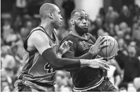  ?? KEN BLAZE, USA TODAY SPORTS ?? Al Horford, left, and the Celtics are pursuing LeBron James and the Cavaliers in the Eastern Conference.