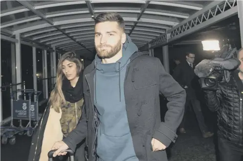  ??  ?? 0 Spanish midfielder Jon Toral arrives at Glasgow Airport last night ahead of completing his loan move to Rangers from Arsenal.