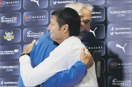  ?? PICTURE: SIMON HULME ?? THANKS FOR EVERYTHING: Head coach Jason Gillespie hugs director of cricket Martyn Moxon before explaining his decision to leave Yorkshire.