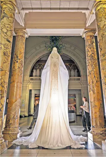  ?? ?? The tree, designed by London-based Miss Sohee, reflected the V&A’S penchant for prioritisi­ng ‘frocks’, said Stephen Bayley