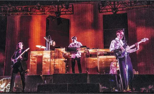  ?? THE ASSOCIATED PRESS ?? From left, Romy Madley Croft, Jamie xx and Oliver Sim of The xx perform at Coachella in Indio, Calif. Friday. The band brings its act to Vancouver next week.